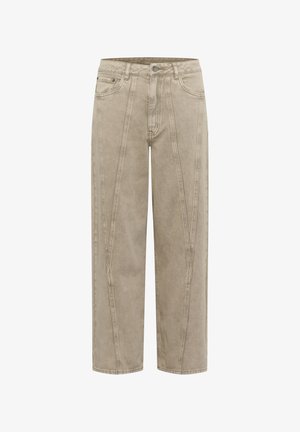 Pantaloni beige a gamba larga realizzati in un morbido tessuto testurizzato con cuciture in evidenza e taglio dritto. Presentano una chiusura con bottone e zip.
