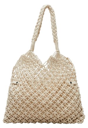 Duża beżowa torba typu tote z makramy, z plecionymi uchwytami i wzorem z okrągłych węzłów na podszewce materiałowej.