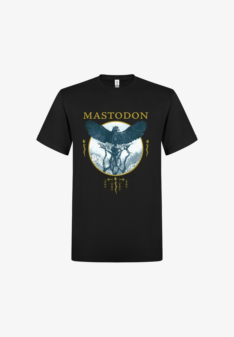 Zwart T-shirt met "MASTODON" tekst boven een cirkelvormig ontwerp van een gevleugelde vogel die op gedraaide takken zit met bloemaccenten.