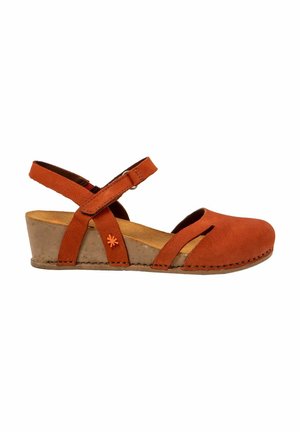 Orange suede wedge sandals with a cross-strap design, open toe, and a decorative flower accent. Textured brown wedge heel.
