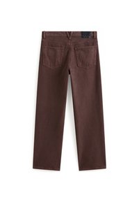 Brown cotton straight-leg pants with a high waist, two back pockets, and a textured black brand tag on the waistband.