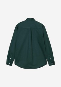 Maglietta a maniche lunghe verde scuro in cotone. Presenta un colletto con bottoni, polsini con bottoni e un orlo arcuato con una piega centrale sul retro.