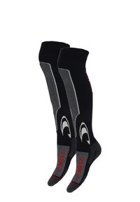 Zwarte sportsokken met een geribbelde boord, verstevigde hiel en teen, voorzien van textuurpanelen en contrasterende witte en rode accenten.