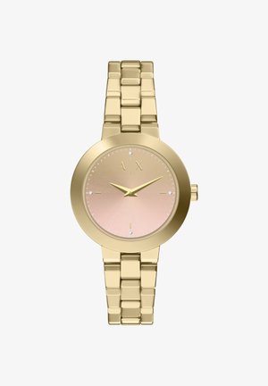 Guldtonet ur med poleret rund kasse, urskive i blush-gradient og krystalaccenter. Har en guld metal ledrem og simple timemarkører.