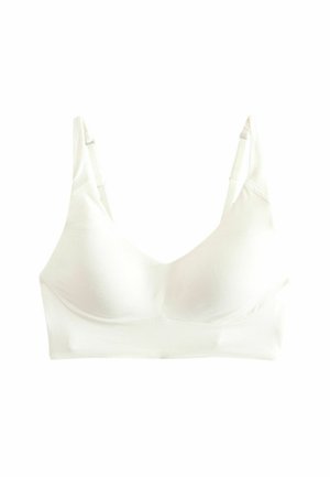 Reggiseno wireless bianco realizzato in un tessuto liscio e elasticizzato. Presenta spalline regolabili e un design semplice, privo di decorazioni o fantasia.
