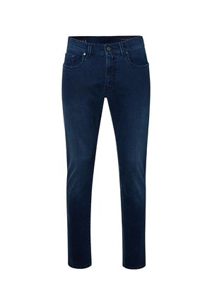 Jean en denim bleu foncé avec une coupe slim, présentant des poches cousues, une fermeture à bouton et une texture lisse.