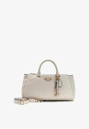 Sac à main Guess beige avec motif de logo embossé, double poignée, pompons décoratifs et bandoulière assortie amovible avec ferrures dorées.