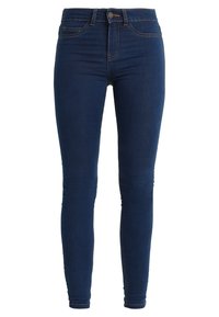 Jeans skinny azul oscuro hechos de tela de mezclilla. Presentan una cintura alta, bolsillos frontales y detalles de costura en contraste.