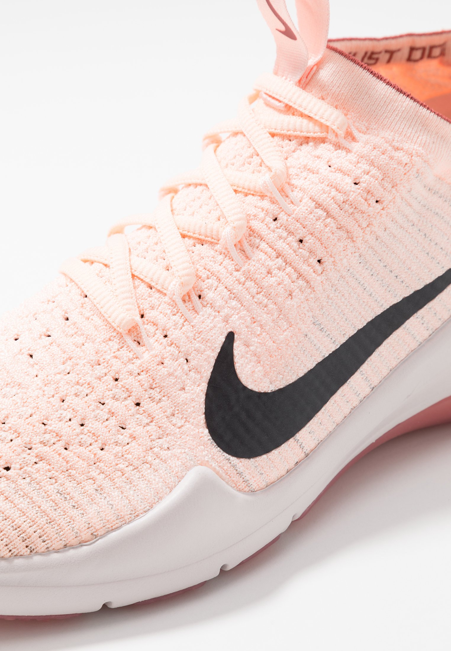 nike training air zoom fearless trainers in rose gold