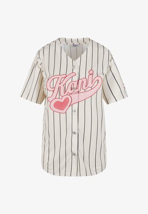 Short-sleeve, cream baseball jersey with vertical black stripes. Features pink "Kani" graphic and heart design. Button front closure.