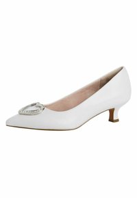 Pompe en cuir verni blanc avec un bout pointu, un petit talon et un accent en strass en forme de cœur sur le devant. Texture lisse sur l'ensemble.