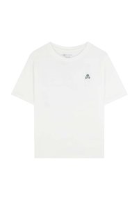 T-shirt bianco a maniche corte in cotone con scollatura tonda e un piccolo logo di teschio e ossa incrociate grigio sul lato sinistro del petto.