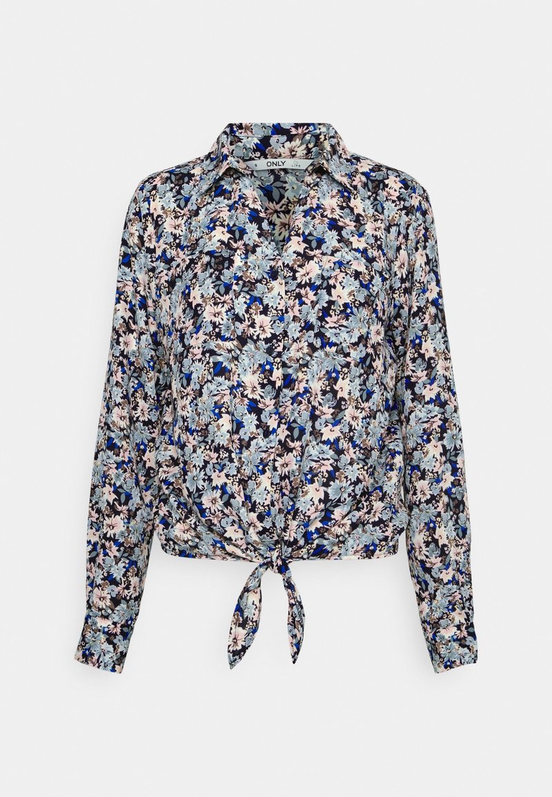 Blouse à manches longues à fleurs bleues, noires et beiges, fermeture boutonnée devant, col et nœud noué devant à la taille.