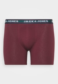 Burgunderfarbene Boxershorts aus weicher Baumwolle mit einem dunkelblauen elastischen Taillenbund, der mit weißem "JACK & JONES"-Branding und gestickten Details versehen ist.