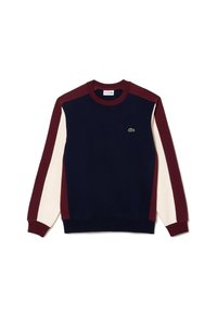 Sudadera azul marino con mangas en granate y crema, puños y dobladillo acanalados, con un pequeño logo verde de Lacoste en el pecho.