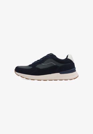 Marineblauer und dunkelgrauer Sneaker mit weißem Fersenlasche, welliger Seitennaht, weißer Mittelsohle und Gummiaußensohle, von der Außenseite gezeigt.