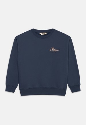 Sügavsinine mütsiteta dressipluus pikkade varrukatega, soonikkoes mansettide ja äärega, väike Ellesse logo ja tekst vasakul rinnal.