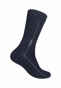 Calzino blu scuro realizzato in morbido tessuto, con cima a costine, punta e tallone rinforzati, cuciture a contrasto e un piccolo dettaglio con il logo.
