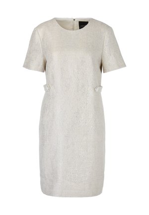 Short-sleeve dress in light cream, textured fabric with a delicate pattern. Features a back zipper and two button accents at the waist.