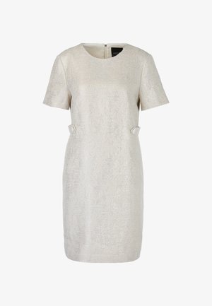 Short-sleeve dress in light cream, textured fabric with a delicate pattern. Features a back zipper and two button accents at the waist.