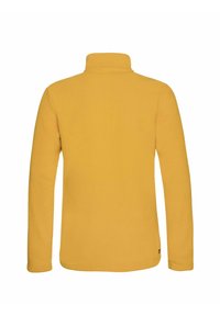 Žlutý fleecový pulovr s vysokým límcem a dlouhými rukávy. Hladká textura, bez viditelných vzorů a s malým logem značky na lemu.