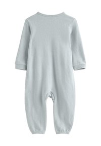 Un body bleu clair à manches longues en tissu doux. Il possède un col rond, des poignets élastiques et des chevilles froncées pour un ajustement confortable.