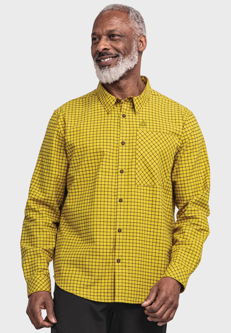 Gelb kariertes Hemd mit Button-Down-Kragen, ausgestattet mit braunen Karomustern, einer Brusttasche und strukturiertem Stoff.