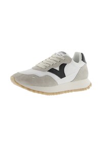 White and beige sneaker with black "V" logo on side, beige laces, textured sole, and suede detailing on toe and heel areas.