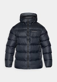 Doudoune navy avec un col haut, fermeture éclair intégrale et panneaux cousus. Présente un logo Peak Performance sur la poitrine ; texture lisse et brillante.