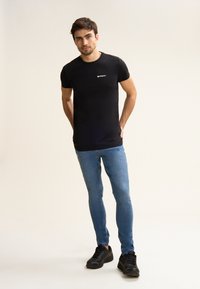 Freddy IN BULL ELASTICIZZATO - Pantalones - jeans chiaro-cuciture beige