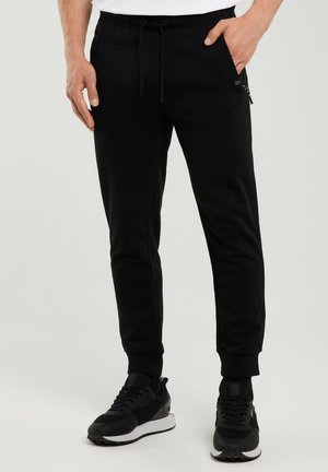 PYLYP - Tréningruha alsók - schwarz