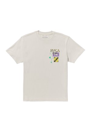 T-shirt en coton beige clair avec un design multicolore comprenant du texte et des formes géométriques sur le devant. Manches courtes et col rond.
