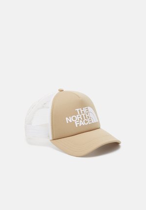 Beżowo-biała czapka bejsbolowa z siateczkowym tyłem i białym logo "THE NORTH FACE" na przednim panelu.