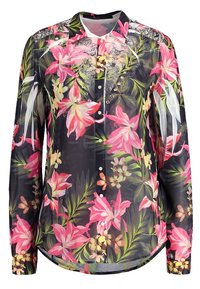 Blouse noire à manches longues avec imprimé floral rose vif, détails en dentelle au niveau du yoke et petits clous décoratifs le long de la poitrine.