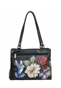 Zwarte leren handtas met levendige bloemenkunst en een kolibrie. Bevat een ritsvak aan de voorkant en twee schouderriemen.