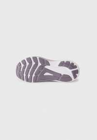 Shoe sole featuring a purple rubber base with textured patterns and a white midsole. Notable grooves and traction elements are visible.