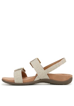 Sandalo beige con cinturino regolabile, sottopiede imbottito e suola in gomma texturizzata, progettato per un uso casual e comfort.