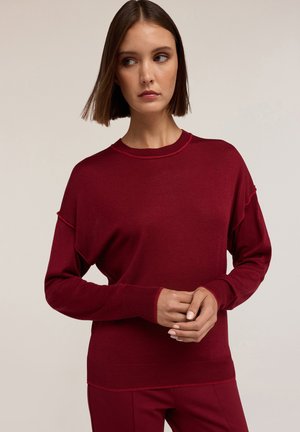 - Sweter