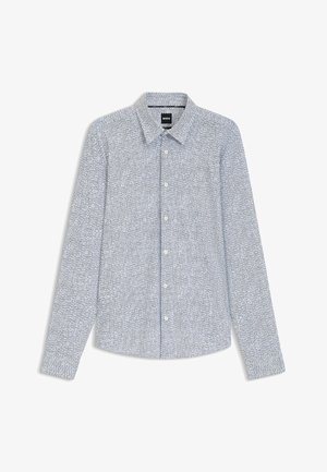 Camicia a maniche lunghe con bottoni in bianco e blu navy con un motivo geometrico. Presenta un colletto classico e chiusura con bottoni sul davanti.