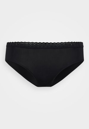 Črne spodnje hlače z gladko teksturo, ki imajo obrobo iz čipke v obliki školjk. Preprost kroj z visokim izrezom. Brez vidnih vzorcev ali detajlov.