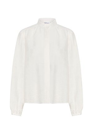 Valge pikkade varrukatega pluus, millel on mandariinikaelus, tekstureeritud kangas ja volditud mansetid, esitatud vabalt langevas lõikes.