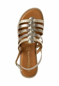 Metallic gold strappy sandal with textured accents, tan padded insole, and braided sole, featuring adjustable ankle strap and open toe design.