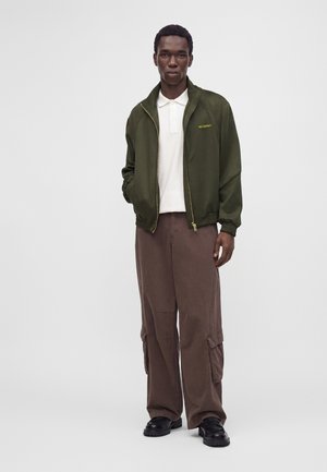 Han Kjøbenhavn, LOGO TRACK UNISEX - Sweat zippé - deep green
