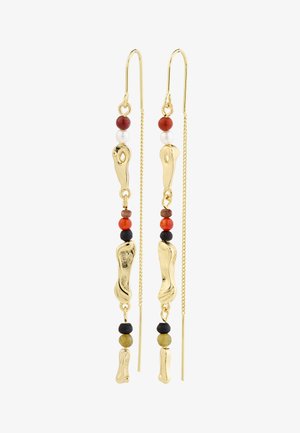 Gold-tone drop earrings featuring textured, sculptural shapes, alternating with red, white, and black beads. Includes chain accents.