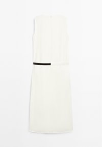 Sleeveless white dress with a black waist belt detail, smooth texture, knee-length, and a back zipper closure.
