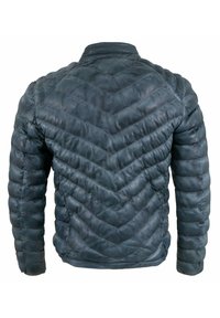 Dunkelblau gesteppte Jacke mit Zickzackmuster, ausgestattet mit einem Stehkragen und einer glatten, leicht glänzenden Textur.