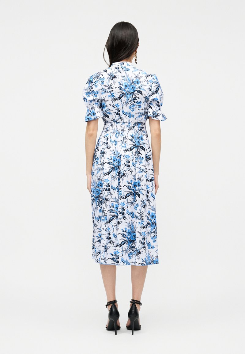 black and white animal print midi dress Meg Leopard Midi Dress in Black Leopard Polka Dot