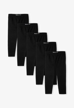 Leggings de algodón negros, elásticos con una cinturilla elástica, dispuestos en fila. Cada par parece idéntico en diseño y longitud.