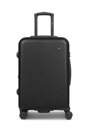 Black hard-shell suitcase with a smooth texture, retractable handle, four wheels, and logo detail on the front. Simple rectangular design.