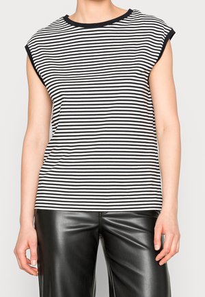 Black and white striped sleeveless top with a rounded neckline and soft fabric, paired with shiny black faux leather pants.